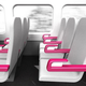 Illustration for article titled Could a Simple Design Tweak End Airplane Armrest Battles for Good?